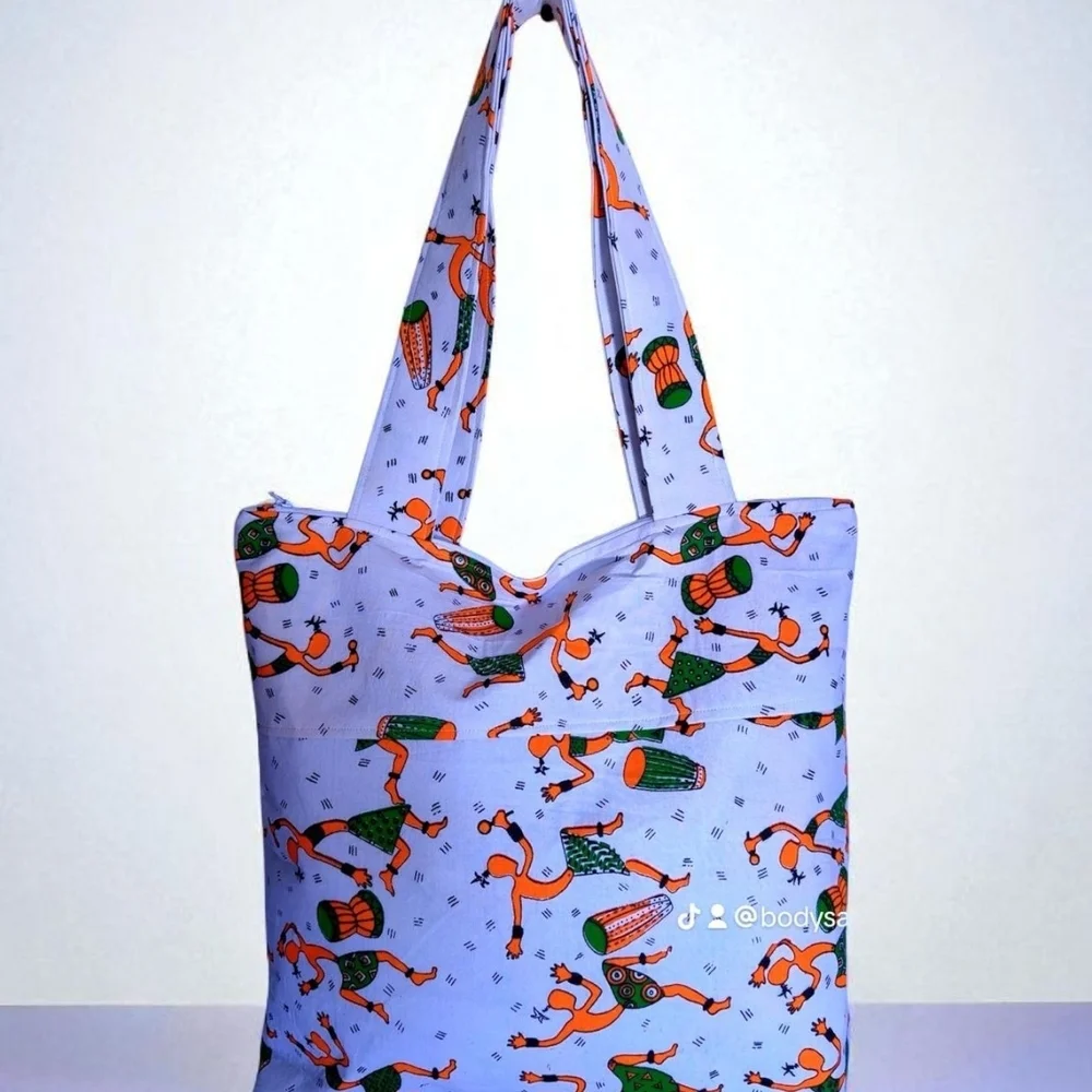 Vibrant Purple Tote Bag with Artistic Design